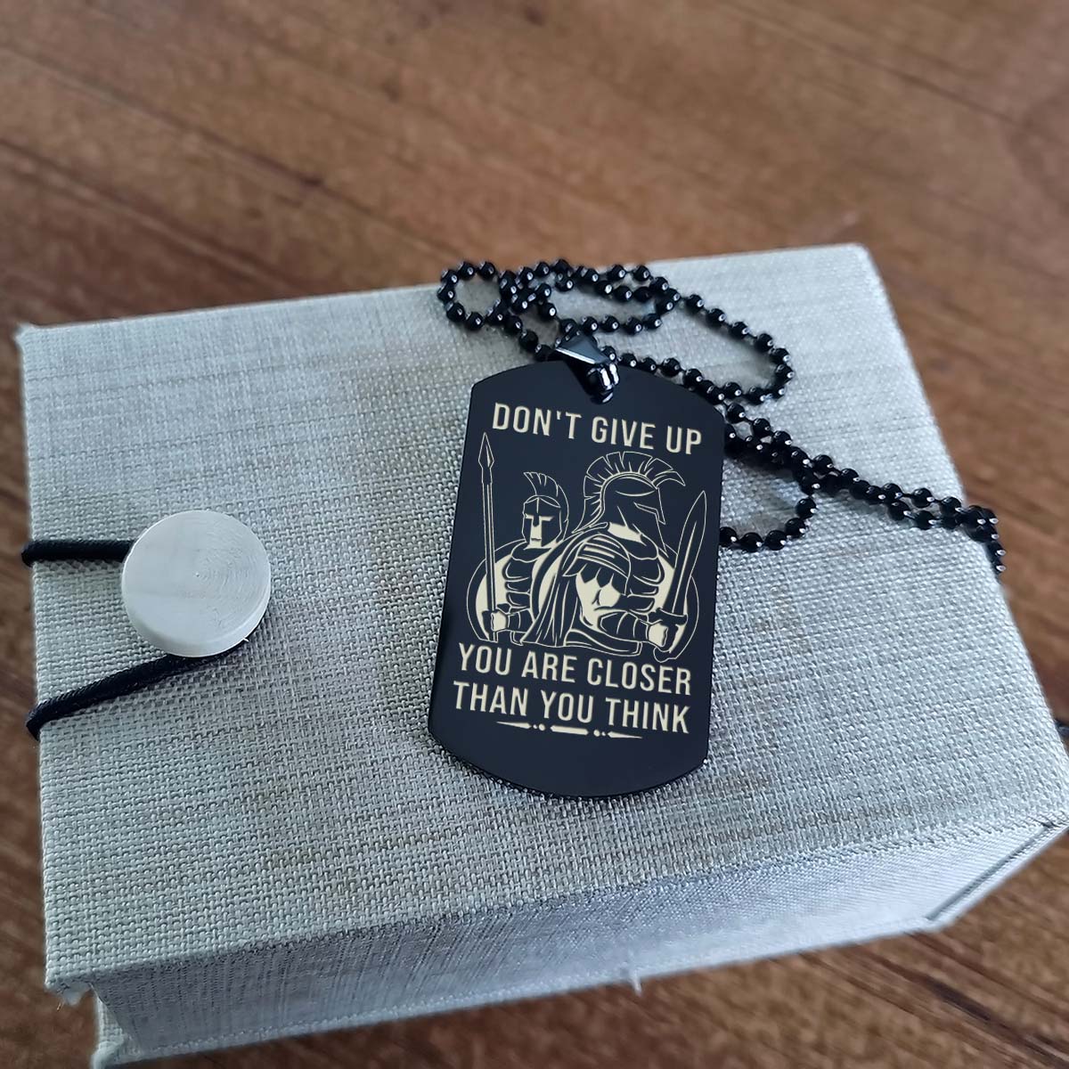 WAD067 - Don't Give Up - It's Not About Being Better Than Someone Else - Warrior - Spartan Necklace - Engrave Black Dog Tag.png
